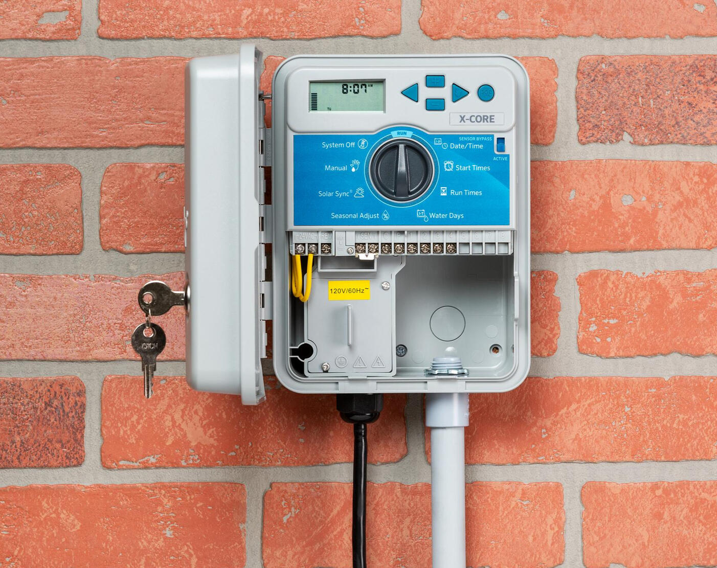 Hunter Industries sprinkler controller installation in Longview, Texas. Smart irrigation system setup for efficient water management across East Texas properties